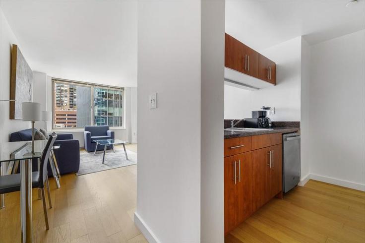 New York ManhattanのBuilding West 57th Street - churchillliving - 1016198 - NYCのアパートメントにある、モダンな家具を備えたエレガントなデザインのリビングルーム New York ManhattanのBuilding West 57th Street - churchillliving - 1016198 - NYCのアパートメントにある、モダンな家具を備えたエレガントなデザインのリビングルーム