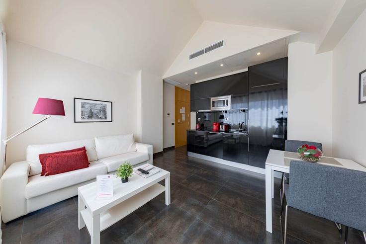 Salle de séjour élégante avec mobilier moderne dans un appartement à Building Calle de Fuencarral - cituspace-sl - 1524116 à Chamberí, Madrid