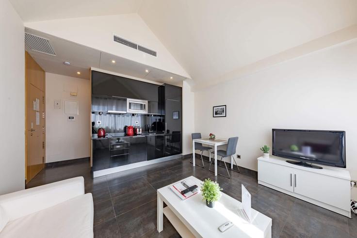 Building Calle de Fuencarral - cituspace-sl - 1524116 adresindeki bir dairede modern mobilyalarla zarif bir şekilde tasarlanmış oturma odası Chamberí, Madrid