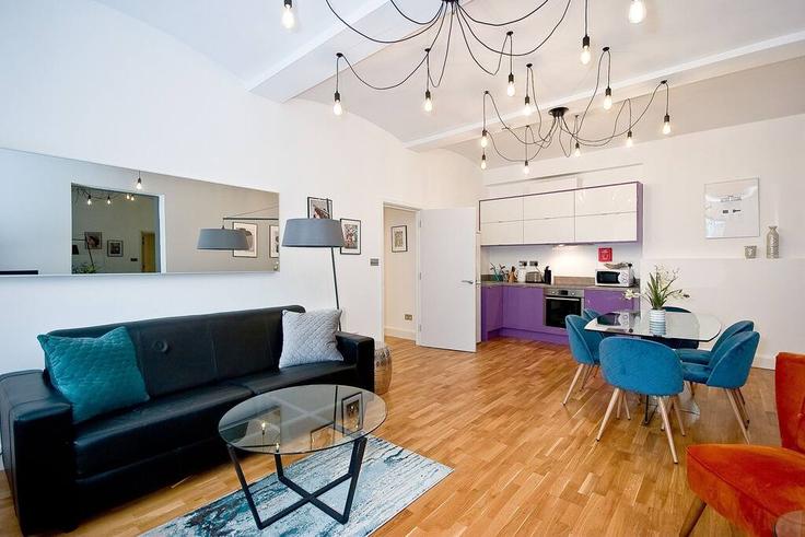 Elegantly designed living room with modern furnishings in an apartment at Building Bowling Green Lane - city-living-london - 1224938 in London Borough of Islington, London