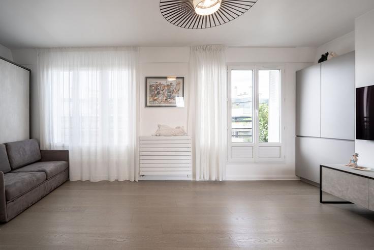Elegantly designed living room with modern furnishings in an apartment at Building Rue de l'Abbé Groult - city-relay-rr - 1563562 in 15th arrondissement, Paris