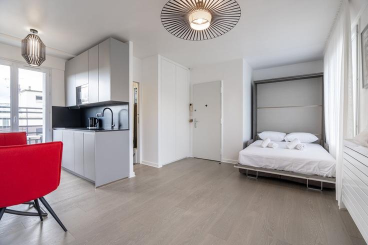 Sala de estar elegantemente projetada com móveis modernos em um apartamento no Building Rue de l'Abbé Groult - city-relay-rr - 1563562 em 15th arrondissement, Paris Sala de estar elegantemente projetada com móveis modernos em um apartamento no Building Rue de l'Abbé Groult - city-relay-rr - 1563562 em 15th arrondissement, Paris