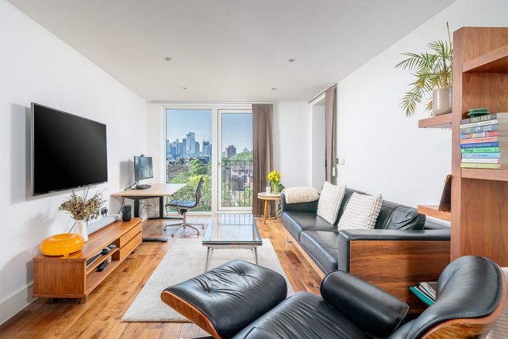 Salle de séjour élégante avec mobilier moderne dans un appartement à Building De Beauvoir Crescent - city-relay-rr - 1549010 à London Borough of Hackney, London