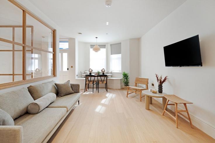 Royal Borough of Kensington and Chelsea, London에 위치한 Building Flat 3 Flat 3, 39 Bramham Gardens, London SW5 0JE London - city-relay-rr - 1581726 유닛의 세련된 인테리어가 돋보이는 거실 Royal Borough of Kensington and Chelsea, London에 위치한 Building Flat 3 Flat 3, 39 Bramham Gardens, London SW5 0JE London - city-relay-rr - 1581726 유닛의 세련된 인테리어가 돋보이는 거실