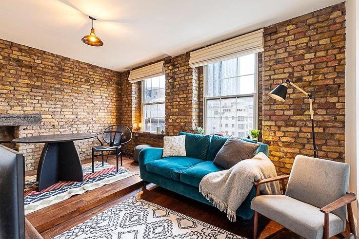 Building Wentworth Street - city-relay-rr - 1494876 adresindeki bir dairede modern mobilyalarla zarif bir şekilde tasarlanmış oturma odası London Borough of Tower Hamlets, London