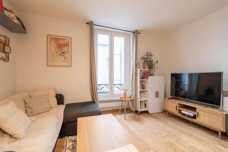 Salle de séjour élégante avec mobilier moderne dans un appartement à Building Passage Geffroy-Didelot - city-relay-rr - 1506447 à 17th arrondissement, Paris Salle de séjour élégante avec mobilier moderne dans un appartement à Building Passage Geffroy-Didelot - city-relay-rr - 1506447 à 17th arrondissement, Paris