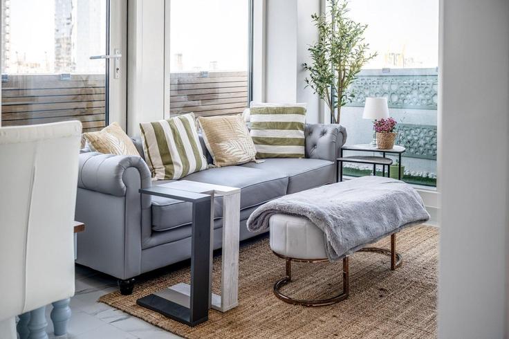 Elegante sala de estar con mobiliario moderno en un apartamento en Building Limeharbour - city-relay-rr - 1494830 en London Borough of Tower Hamlets, London