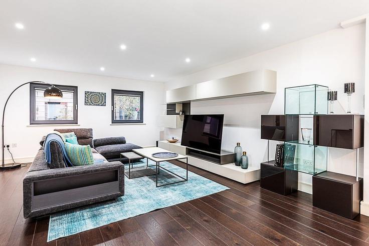 Elegantly designed living room with modern furnishings in an apartment at Building Wiblin Mews - city-relay - 1342613 in London Borough of Camden, London