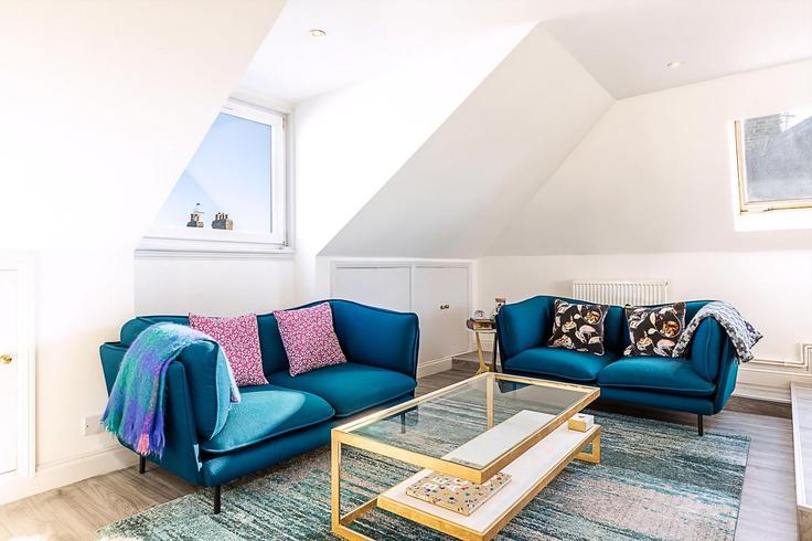 Elegantly designed living room with modern furnishings in an apartment at Building Devonport Road - city-relay - 1376640 in London Borough of Hammersmith and Fulham, London