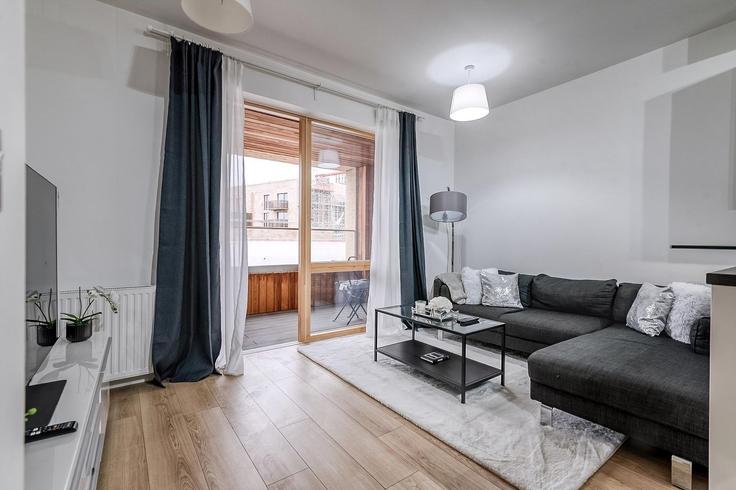 Sala de estar elegantemente projetada com móveis modernos em um apartamento no Building Rathbone Street - city-relay - 1237251 - LON em London Borough of Newham, London Sala de estar elegantemente projetada com móveis modernos em um apartamento no Building Rathbone Street - city-relay - 1237251 - LON em London Borough of Newham, London