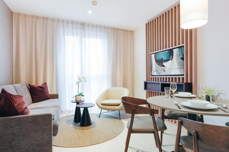 Salle de séjour élégante avec mobilier moderne dans un appartement à Building Zeughausstrasse - city-stay - 1634776 à Aussersihl, Zurich Salle de séjour élégante avec mobilier moderne dans un appartement à Building Zeughausstrasse - city-stay - 1634776 à Aussersihl, Zurich