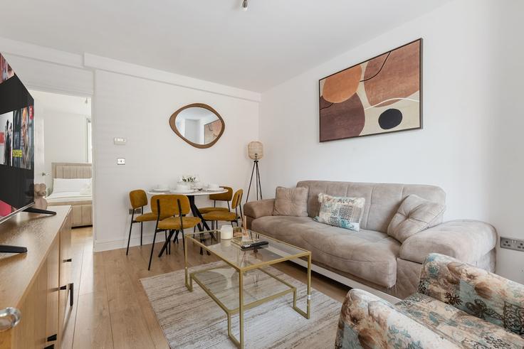 Salle de séjour élégante avec mobilier moderne dans un appartement à Building Martlett Court - cityscape-property-ltd - 1605299 à City of Westminster, London Salle de séjour élégante avec mobilier moderne dans un appartement à Building Martlett Court - cityscape-property-ltd - 1605299 à City of Westminster, London