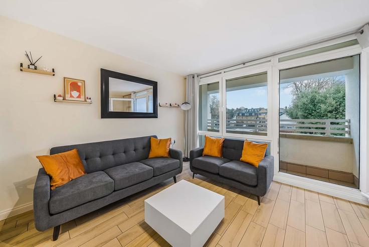 Elegante sala de estar con mobiliario moderno en un apartamento en Building Robertson Street - cityservicelets - 1537768 en London Borough of Wandsworth, London Elegante sala de estar con mobiliario moderno en un apartamento en Building Robertson Street - cityservicelets - 1537768 en London Borough of Wandsworth, London