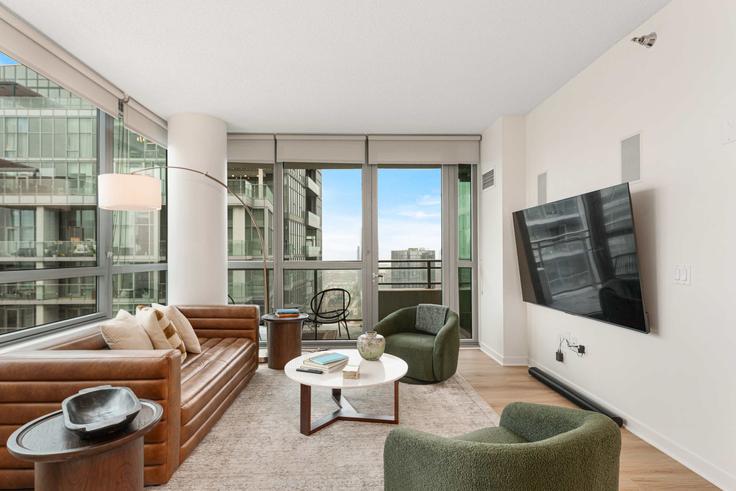 Salle de séjour élégante avec mobilier moderne dans un appartement à Building West Kinzie Street - cloud9-guesty - 1243850 - CHI à Chicago, Chicago Salle de séjour élégante avec mobilier moderne dans un appartement à Building West Kinzie Street - cloud9-guesty - 1243850 - CHI à Chicago, Chicago