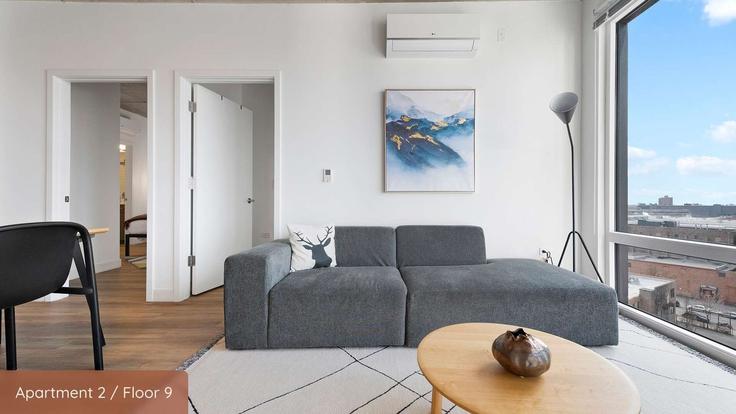 Chicago ChicagoのBuilding West Blackhawk Street - cloud9-guesty - 1243848 - CHIのアパートメントにある、モダンな家具を備えたエレガントなデザインのリビングルーム Chicago ChicagoのBuilding West Blackhawk Street - cloud9-guesty - 1243848 - CHIのアパートメントにある、モダンな家具を備えたエレガントなデザインのリビングルーム