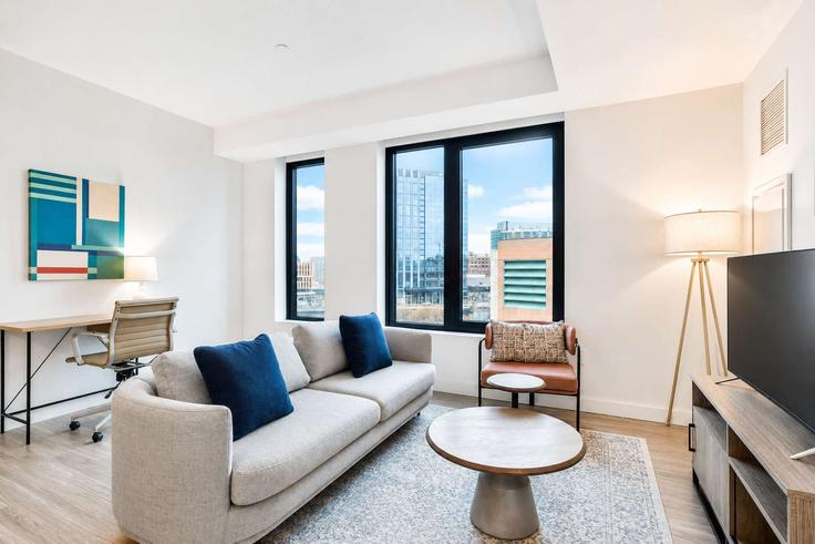 Boston, Boston에 위치한 Building Congress Street - compassfurnishedapartments - 1522228 유닛의 세련된 인테리어가 돋보이는 거실