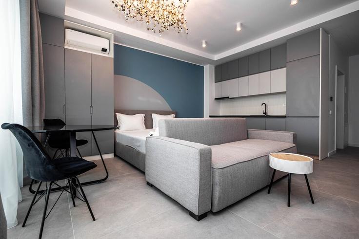 Elegante sala de estar con mobiliario moderno en un apartamento en Building Romania - constantin-mirauta - 1492237 en Constanța, Constanța Elegante sala de estar con mobiliario moderno en un apartamento en Building Romania - constantin-mirauta - 1492237 en Constanța, Constanța
