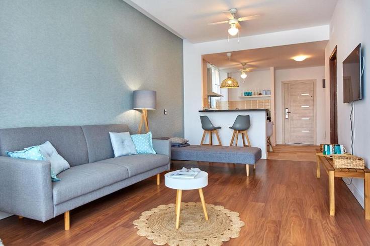 Elegante sala de estar con mobiliario moderno en un apartamento en Building Strada D25 - constantin-mirauta - 1492248 en Mamaia-Sat, Mamaia-Sat Elegante sala de estar con mobiliario moderno en un apartamento en Building Strada D25 - constantin-mirauta - 1492248 en Mamaia-Sat, Mamaia-Sat