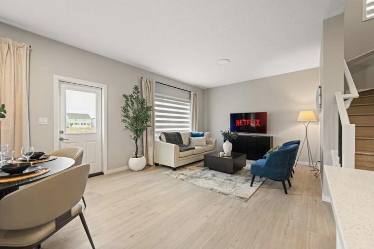 Edmonton EdmontonのBuilding Erlanger Link Northwest - contigo-properties - 1358021のアパートメントにある、モダンな家具を備えたエレガントなデザインのリビングルーム Edmonton EdmontonのBuilding Erlanger Link Northwest - contigo-properties - 1358021のアパートメントにある、モダンな家具を備えたエレガントなデザインのリビングルーム