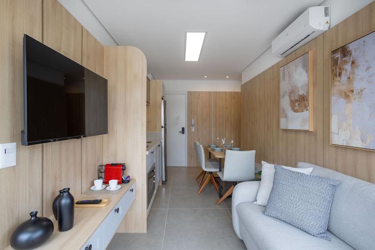 Elegantly designed living room with modern furnishings in an apartment at Building Rua Pedroso - conviva-stay - 1539180 in Liberdade, São Paulo