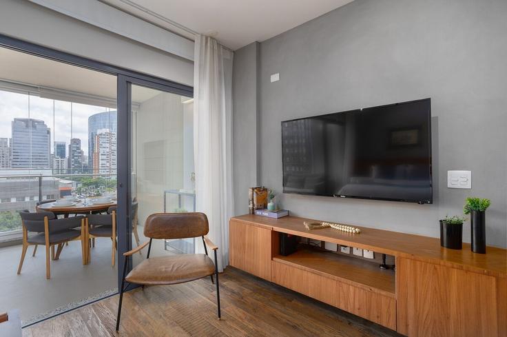 Sala de estar elegantemente projetada com móveis modernos em um apartamento no Building Rua Ministro Jesuíno Cardoso - conviva-stay - 1539110 em Vila Nova Conceição, São Paulo Sala de estar elegantemente projetada com móveis modernos em um apartamento no Building Rua Ministro Jesuíno Cardoso - conviva-stay - 1539110 em Vila Nova Conceição, São Paulo