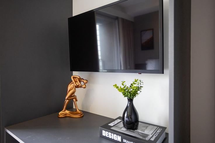 Sala de estar elegantemente projetada com móveis modernos em um apartamento no Building Rua dos Pinheiros - conviva-stay - 1539104 em Pinheiros, São Paulo Sala de estar elegantemente projetada com móveis modernos em um apartamento no Building Rua dos Pinheiros - conviva-stay - 1539104 em Pinheiros, São Paulo