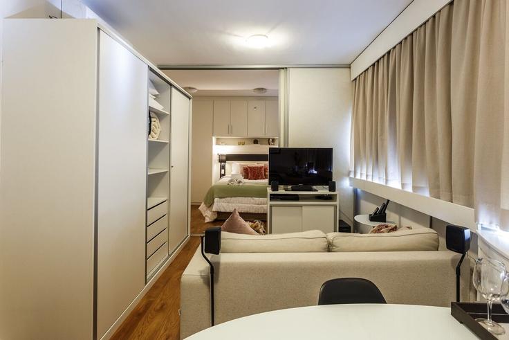 Elegantly designed living room with modern furnishings in an apartment at Building Travessa Carneiro - conviva-stay - 1539142 in Liberdade, São Paulo