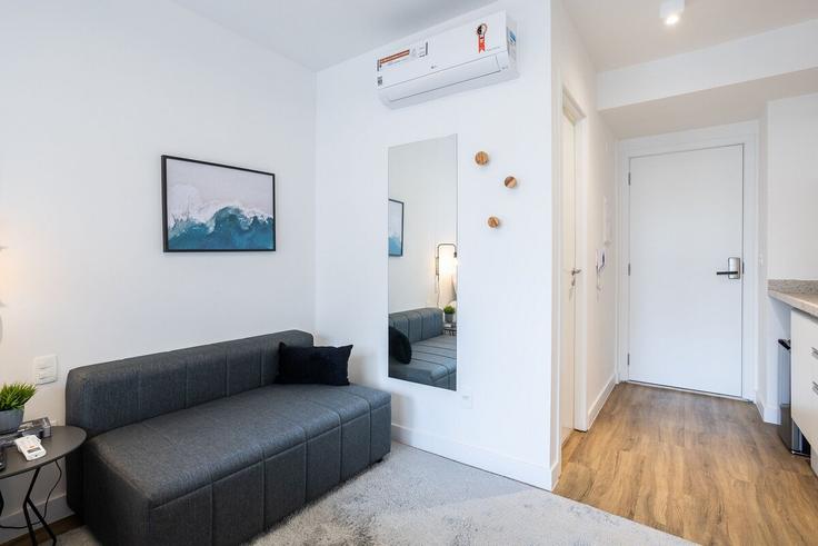 Salle de séjour élégante avec mobilier moderne dans un appartement à Building Avenida Jamaris - conviva-stay - 1539120 à Indianópolis, São Paulo Salle de séjour élégante avec mobilier moderne dans un appartement à Building Avenida Jamaris - conviva-stay - 1539120 à Indianópolis, São Paulo