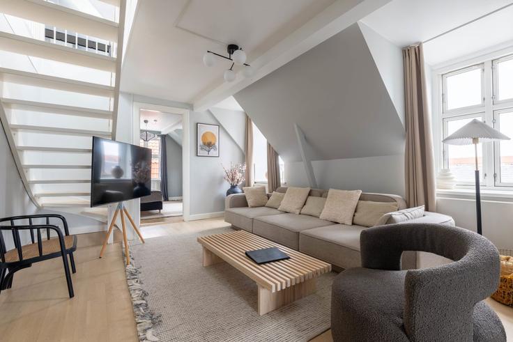 Elegant gestaltetes Wohnzimmer mit moderner Einrichtung in einer Wohnung im Building Biens Allé - copenhagen-living - 1640131 in Copenhagen, Copenhagen