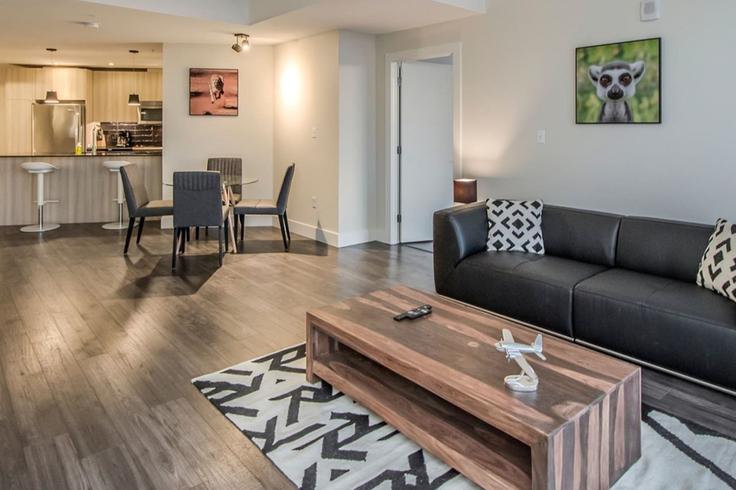 Elegante sala de estar con mobiliario moderno en un apartamento en Building Bedford Highway - corporate-stays - 1222930 - TOR en Rockingham, Halifax Elegante sala de estar con mobiliario moderno en un apartamento en Building Bedford Highway - corporate-stays - 1222930 - TOR en Rockingham, Halifax
