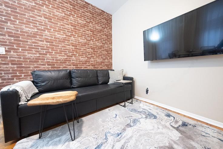 New York ManhattanのBuilding Broadway - coutinhoproperties - 1035601 - NYCのアパートメントにある、モダンな家具を備えたエレガントなデザインのリビングルーム