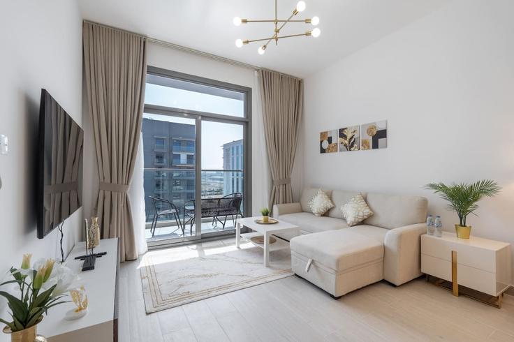 Elegantly designed living room with modern furnishings in an apartment at Building Tariaq Bedon Esm - czechin-holiday-homes - 1505569 in Al Hebiah Second, Dubai