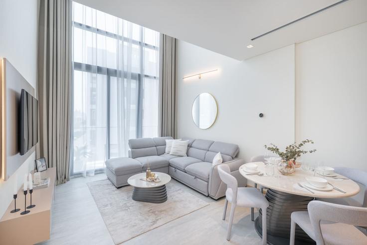 Elegantly designed living room with modern furnishings in an apartment at Building Street 11 - czechin-holiday-homes - 1505603 in Al Barsha South Fourth, Dubai