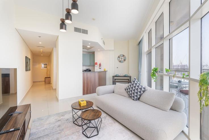 Elegantly designed living room with modern furnishings in an apartment at Building Tariaq Bedon Esm - czechin-holiday-homes - 1505604 in Al Barsha South Fourth, Dubai