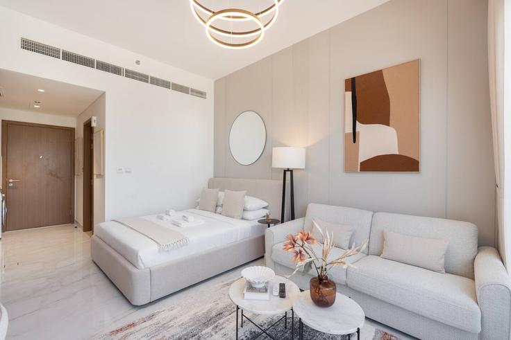 Elegantly designed living room with modern furnishings in an apartment at Building Tariaq Bedon Esm - czechin-holiday-homes - 1505643 in Al Hebiah Second, Dubai