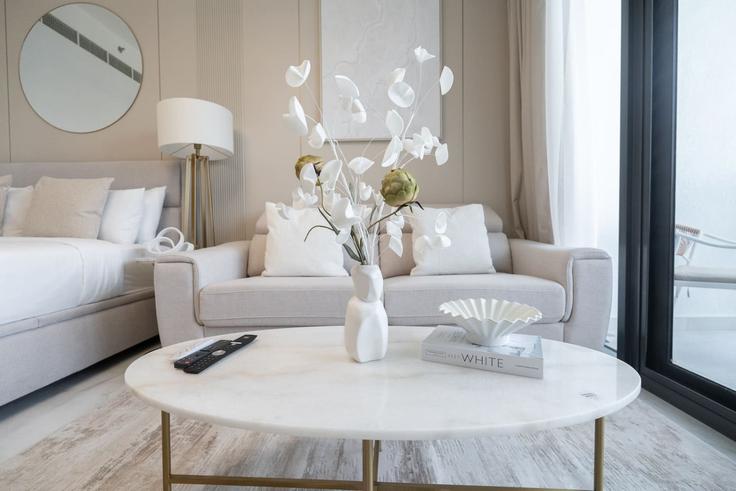 Elegantly designed living room with modern furnishings in an apartment at Building Tariaq Bedon Esm - czechin-holiday-homes - 1507609 in Al Hebiah Second, Dubai