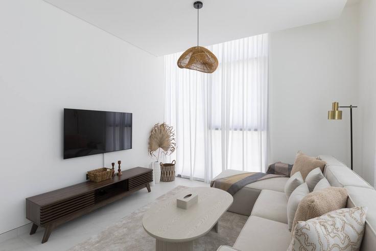 Elegantly designed living room with modern furnishings in an apartment at Building Tariaq Bedon Esm - daify - 1318615 in Al Merkadh, Dubai