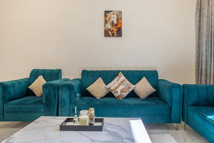 Elegantly designed living room with modern furnishings in an apartment at Building Sheikh Mohammed Bin Zayed Road - dashstays - 1332834 in Al Barsha South Fifth, Dubai