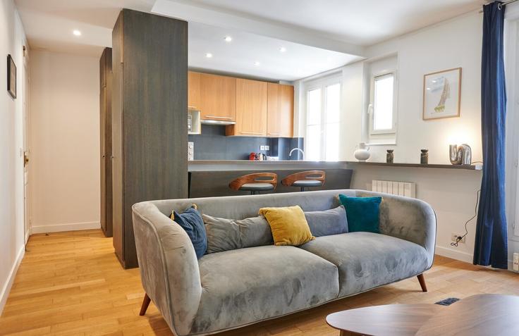 Salle de séjour élégante avec mobilier moderne dans un appartement à Building Avenue Kléber - diamoni - 1531703 à 16th arrondissement, Paris