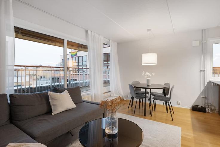 Elegante sala de estar con mobiliario moderno en un apartamento en Building Mandalls gate - dinbnb - 1226223 - NOR en Oslo, Oslo