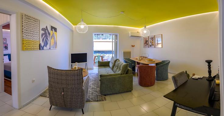 Salle de séjour élégante avec mobilier moderne dans un appartement à Building Spartis - district - 1237476 - ATH à South Athens, Athens Salle de séjour élégante avec mobilier moderne dans un appartement à Building Spartis - district - 1237476 - ATH à South Athens, Athens