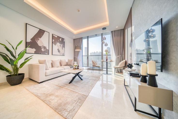 Business Bay, Dubai에 위치한 Building Al Asayel Street - dlx-holiday-homes - 1239049 - DXB 아파트의 세련된 인테리어가 돋보이는 거실 Business Bay, Dubai에 위치한 Building Al Asayel Street - dlx-holiday-homes - 1239049 - DXB 아파트의 세련된 인테리어가 돋보이는 거실