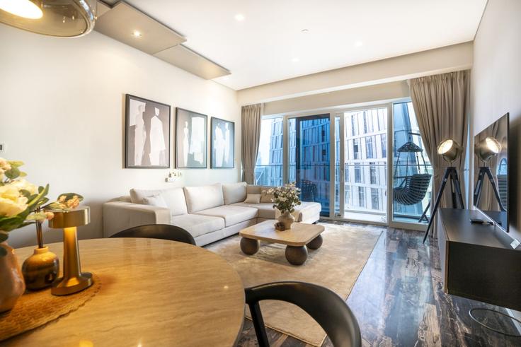 Elegantly designed living room with modern furnishings in an apartment at Building Tariaq Bedon Esm - dlx-holiday-homes - 1239093 - DXB in Dubai Marina, Dubai Elegantly designed living room with modern furnishings in an apartment at Building Tariaq Bedon Esm - dlx-holiday-homes - 1239093 - DXB in Dubai Marina, Dubai