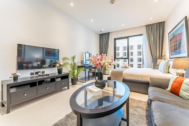 Salle de séjour élégante avec mobilier moderne dans un appartement à Building Tariaq Bedon Esm - dlx-holiday-homes - 1239267 à Al Barsha South Fourth, Dubai Salle de séjour élégante avec mobilier moderne dans un appartement à Building Tariaq Bedon Esm - dlx-holiday-homes - 1239267 à Al Barsha South Fourth, Dubai