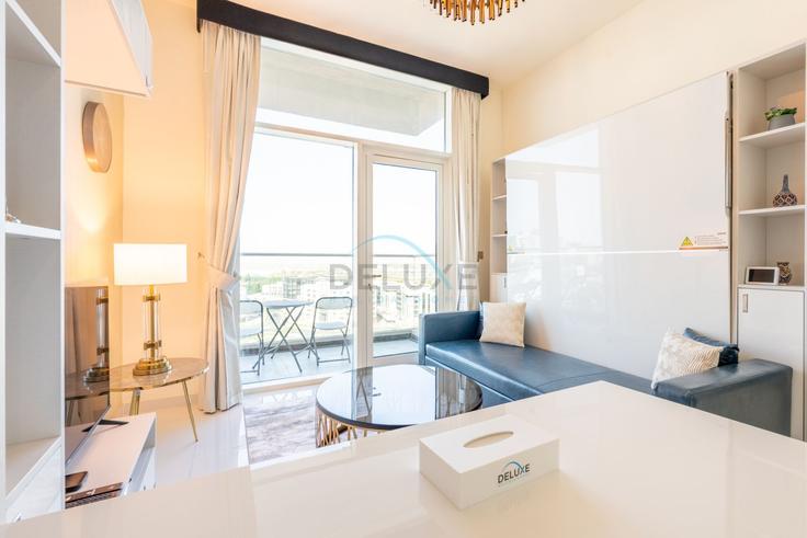 Building Tariaq Bedon Esm - dlx-holiday-homes - 1239338 adresindeki bir dairede modern mobilyalarla zarif bir şekilde tasarlanmış oturma odası Al Barsha South Third, Dubai