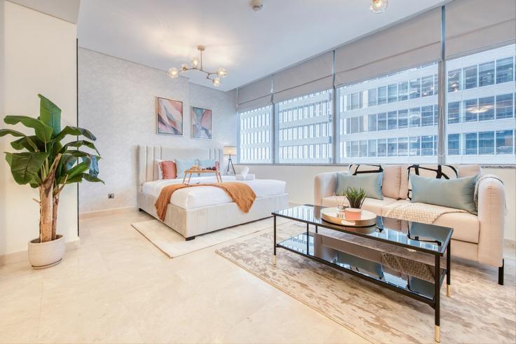Dubai Trade CenterのBuilding Al Mustaqbal Street - dlx-holiday-homes - 1238709のアパートメントにある、モダンな家具を備えたエレガントなデザインのリビングルーム