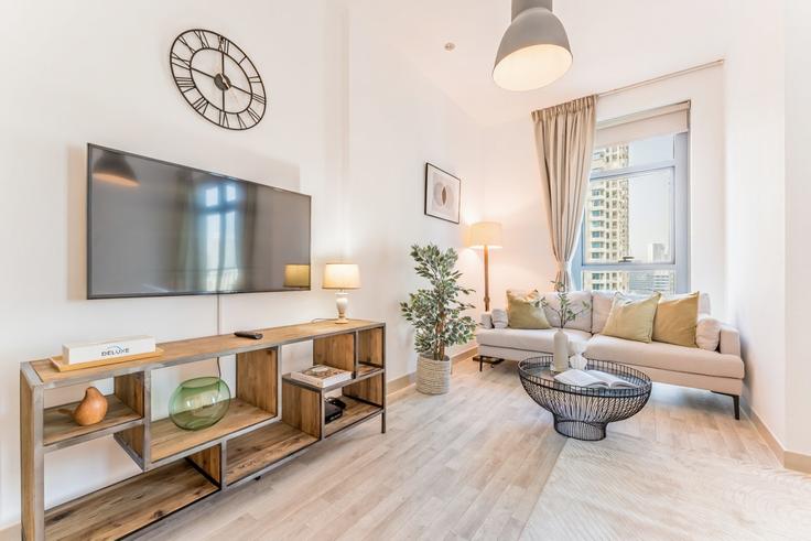 Salle de séjour élégante avec mobilier moderne dans un appartement à Building Al Tahani St - dlx-holiday-homes - 1239316 à Burj Khalifa, Dubai Salle de séjour élégante avec mobilier moderne dans un appartement à Building Al Tahani St - dlx-holiday-homes - 1239316 à Burj Khalifa, Dubai