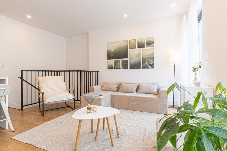 Elegantly designed living room with modern furnishings in an apartment at Building Covert Street - dreamcity-stays - 1515249 in Brooklyn, New York