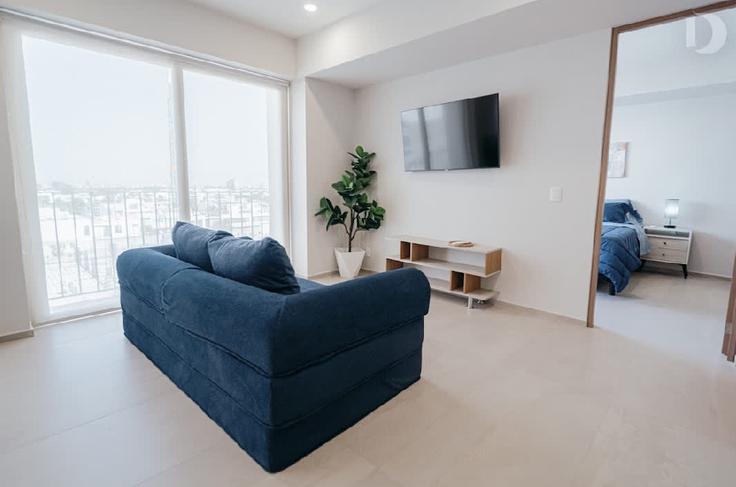 Elegante sala de estar con mobiliario moderno en un apartamento en Building Avenida Naciones Unidas - duna-stays - 1571198 en Zapopan, Zapopan Elegante sala de estar con mobiliario moderno en un apartamento en Building Avenida Naciones Unidas - duna-stays - 1571198 en Zapopan, Zapopan