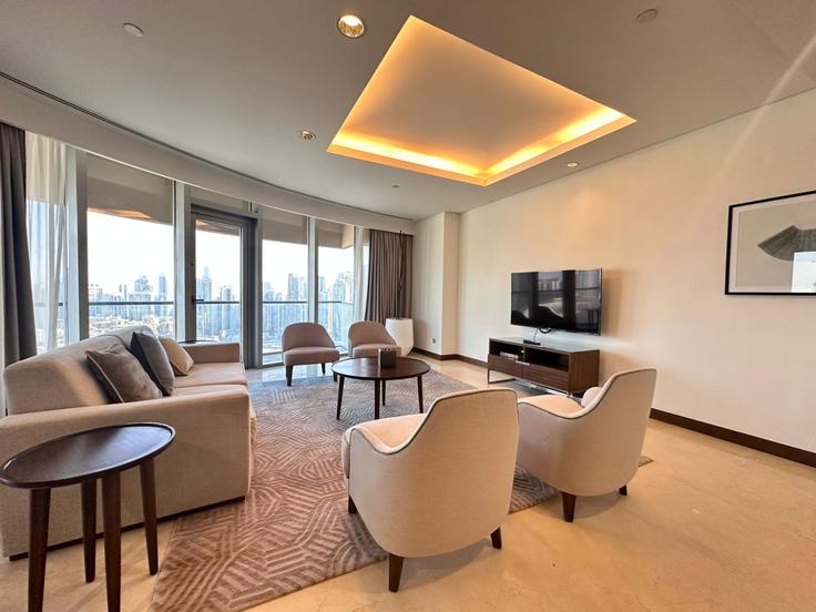 Elegantly designed living room with modern furnishings in an apartment at Building Tariaq Bedon Esm - durrani-holiday-homes-llc - 1294938 - DXB in Downtown Dubai, Dubai Elegantly designed living room with modern furnishings in an apartment at Building Tariaq Bedon Esm - durrani-holiday-homes-llc - 1294938 - DXB in Downtown Dubai, Dubai